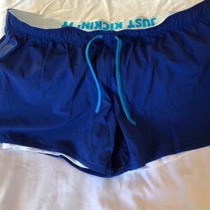 NWT Nike running shorts with fitted shorts lining
